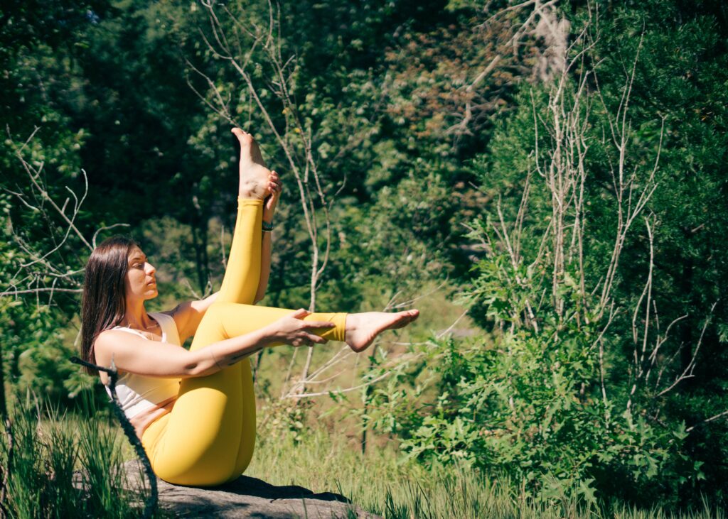 Yogic Definition, Meaning and Use: A Beautiful Woman Doing Yoga in Yoga Tight